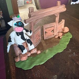 Handcrafted Cow Figurine with Fence Scene